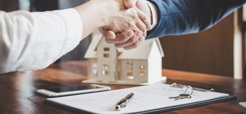Real estate agent handshake
