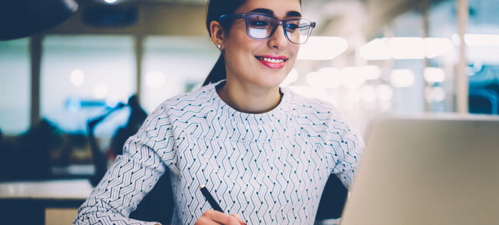 Smart young woman studying real estate